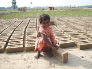Five-year-old Bina should have been in school, but her parents were so poor that every member of her family had to work.