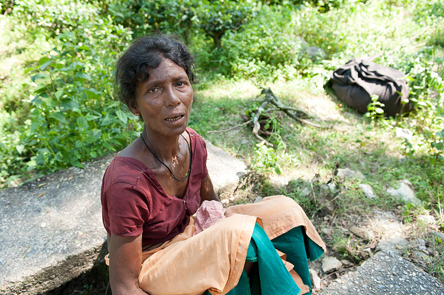 For women like this tea estate laborer, having no outdoor toilet facility could mean risking assault as they go out into an open field in the dark.