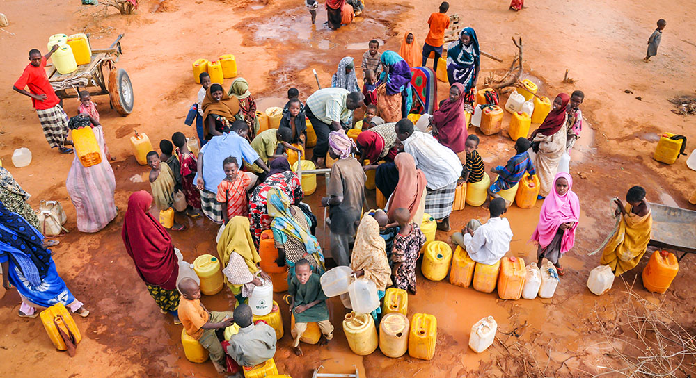 Refugees wait for water in a camp in Dadaab, Somalia