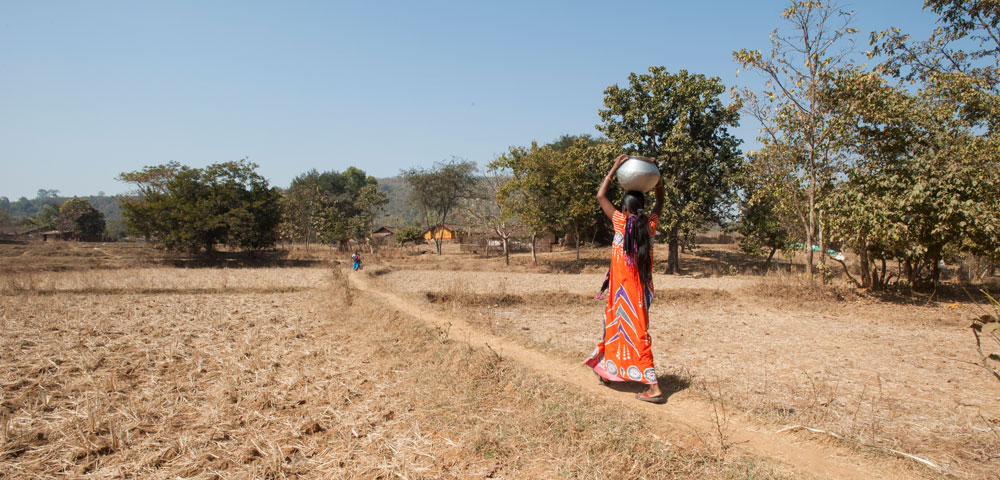 Like this woman, Gulika walked long distances to gather water for her in-laws.