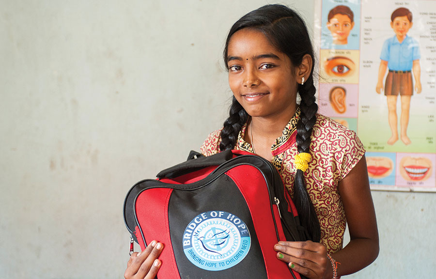 Ashima once faced punishment at school and scolding at home because her family could not afford the school supplies she needed. After she enrolled in Bridge of Hope, which provided for all of her school needs, plus many other gifts to support Ashima's development, she shares, "My future ambition is that I want to become a medical doctor. Especially I want to serve the poor from our society."