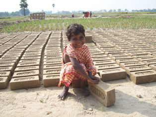 Five-year-old Bina should have been in school, but her parents were so poor that every member of her family had to work
