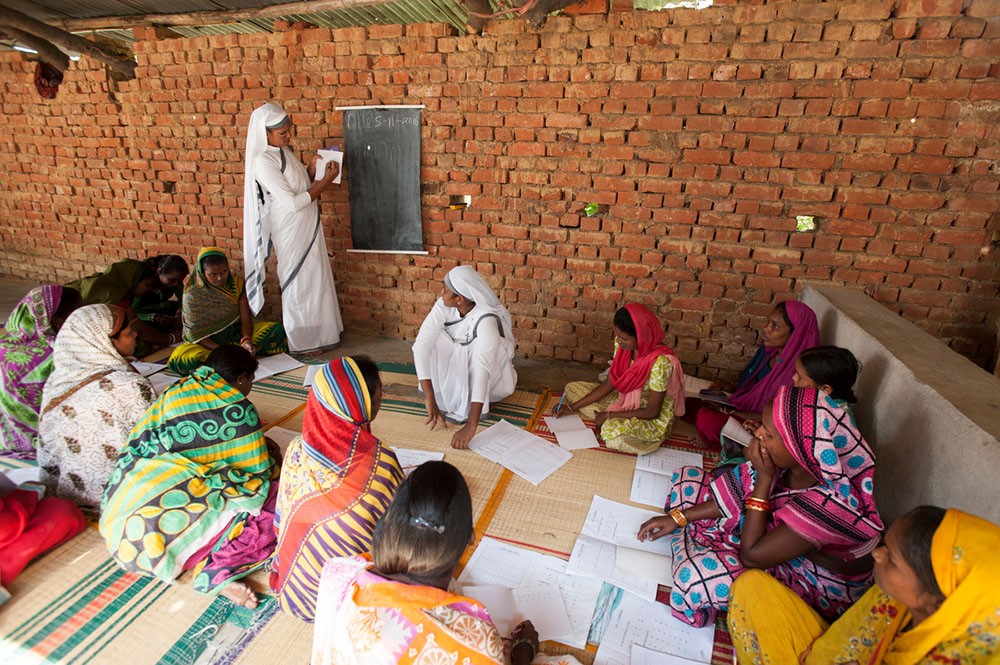 Thirty-five ladies gather for a GFA-supported women's literacy class three days a week in Odisha, India.