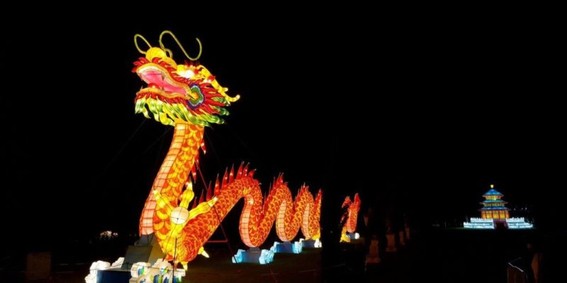China has been disrupting the global economy. The dragon dancing in the streets is symbolic of the one at the eastern end of the Silk Road.