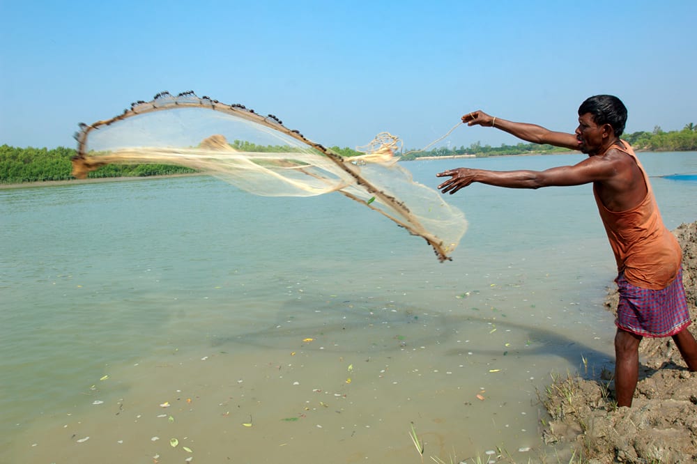 Man casting a fishing net