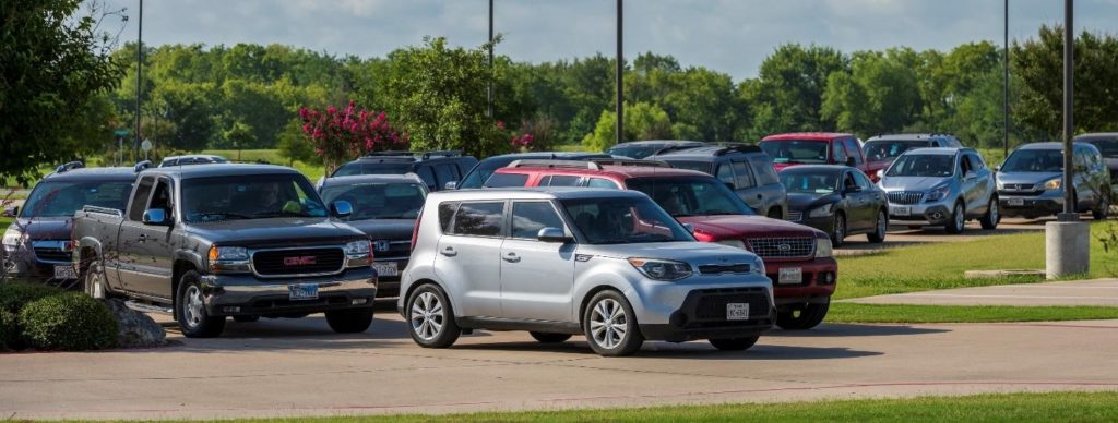 Hundreds of cars lined up on the Gospel for Asia (GFA World) campus on Saturday, July 18, to receive free boxes of fresh food amid COVID-19 pandemic.