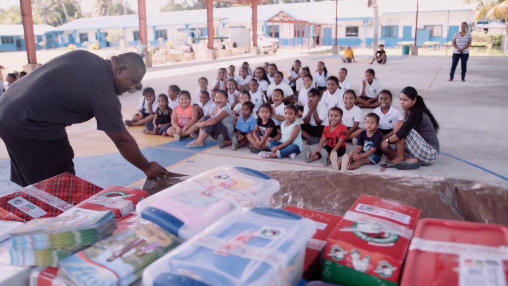 76 students received gift-filled shoeboxes at the first Operation Christmas Child outreach event at the western Pacific island nation.
