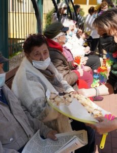 Special Purim activity in which hundreds of volunteers come to the homes of about 1,500 lonely elderly people and give them festive food gifts
