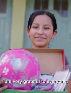 12 yr old girl in Ecuador, praises God for Operation Christmas Child shoebox gift received filled with colored markers and other surprises