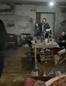 The reality of living with war means constant explosions and many families are taking shelter underground in a basement in East Ukraine.
